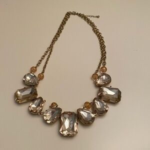 Gold and gem statement necklace.